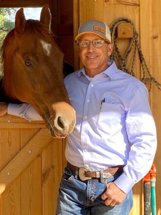 Broker Galen S. Chase with his horse Simon