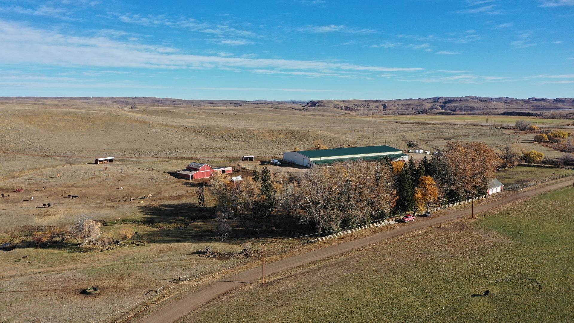 Triangle S Ranch aerial view showing arena and barn
