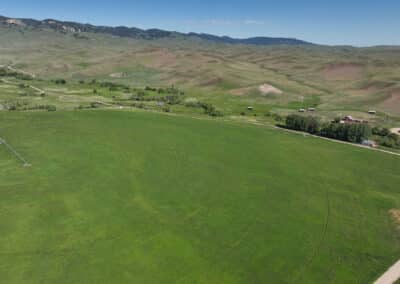 Triangle S Ranch aerial view of arena, home and hay meadow