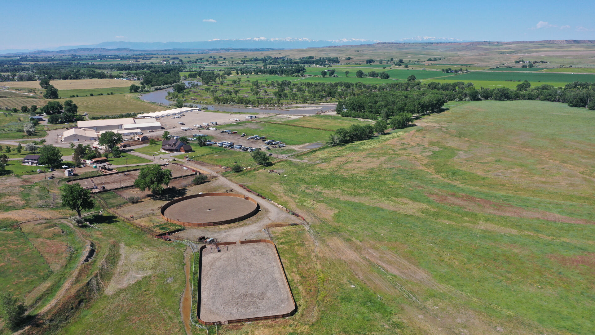 Cottonwood Equine and Equestrian Events Center aerial looking toward beartooth mtns