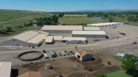 Montana riverfront Cottonwood Equine and Equestrian Events Center barns and indoor arenas