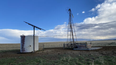 A well on a property we sold that is powered by both a solar collector and wind
