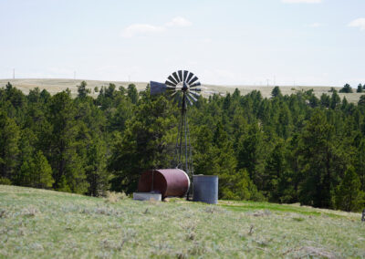 Hat Creek Breaks Retreat windmill and water storage