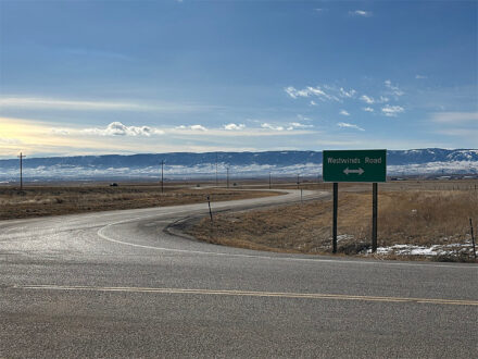 Photo of vacant commercial property just outside Casper, Wyoming city limits, showing the Westwinds Road sign.